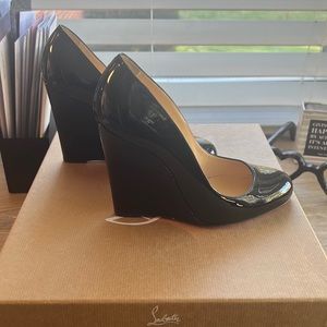 Christian louboutin wedge shoes.